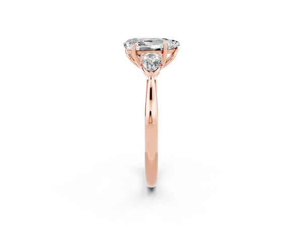 Rose gold Three-Stone Pear Cut Moissanite Ring with Pear  Side Stones in Four-Prong Setting