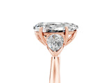 Rose gold Three-Stone Pear Cut Moissanite Ring with Pear  Side Stones in Four-Prong Setting_17
