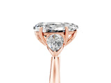 Rose gold Three-Stone Pear Cut Moissanite Ring with Pear  Side Stones in Four-Prong Setting_41