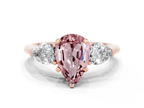 Rose gold Three-Stone Pear Cut Morganite Ring with Pear Side Stones and Four-Prong Setting