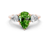 Rose gold Three-Stone Pear Cut Peridot Ring with Pear Side Stones and Four-Prong Setting