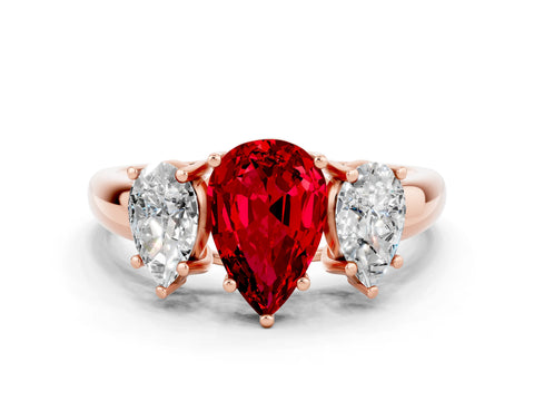 Rose gold Three-Stone Pear Cut Ruby Engagement Ring with Prong Setting