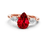 Rose gold Three-Stone Pear Cut Ruby Ring with Pear  Side Stones in Four-Prong Setting_12