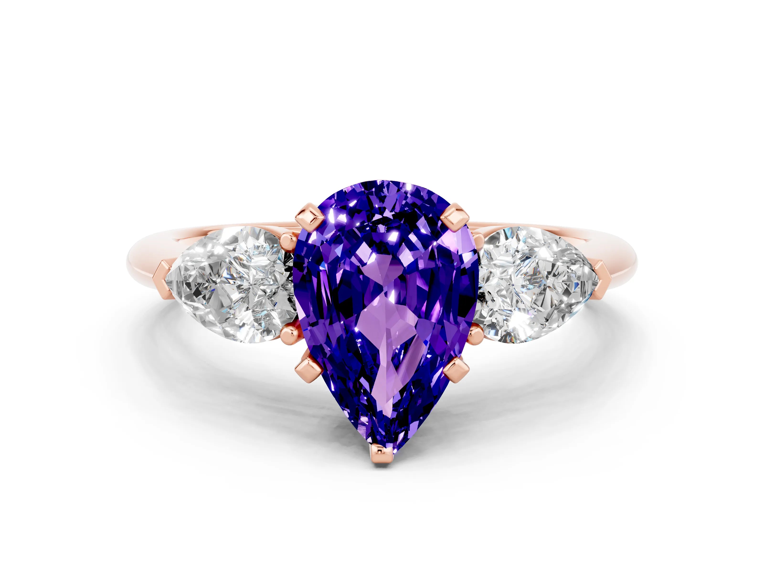 Rose gold Three-Stone Pear Cut Tanzanite Ring with Pear Side Stones and Four-Prong Setting