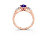 Rose gold Three-Stone Pear Cut Tanzanite Ring with Pear Side Stones and Four-Prong Setting_3