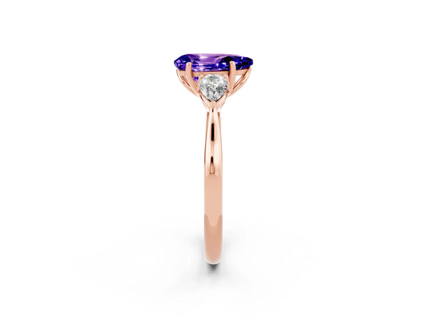 Rose gold Three-Stone Pear Cut Tanzanite Ring with Pear  Side Stones in Four-Prong Setting