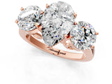 Rose gold Three-Stone Pear Diamond Engagement Ring with Prong Setting on a Classic Band_4