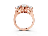 Rose gold Three-Stone Pear Diamond Engagement Ring with Prong Setting on a Classic Band_6