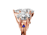 Rose gold Three-Stone Pear Diamond Engagement Ring with Prong Setting on a Classic Band_8