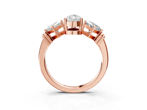 Rose gold Three-Stone Pear and Princess Cut Diamond Ring with Channel Band and Four-Prong Setting