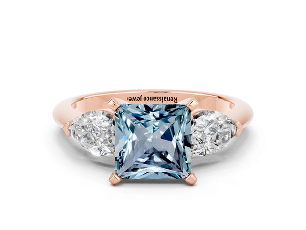 Rose gold Three-Stone Princess Cut Aquamarine Ring with Pear Side Stones and Four-Prong Setting