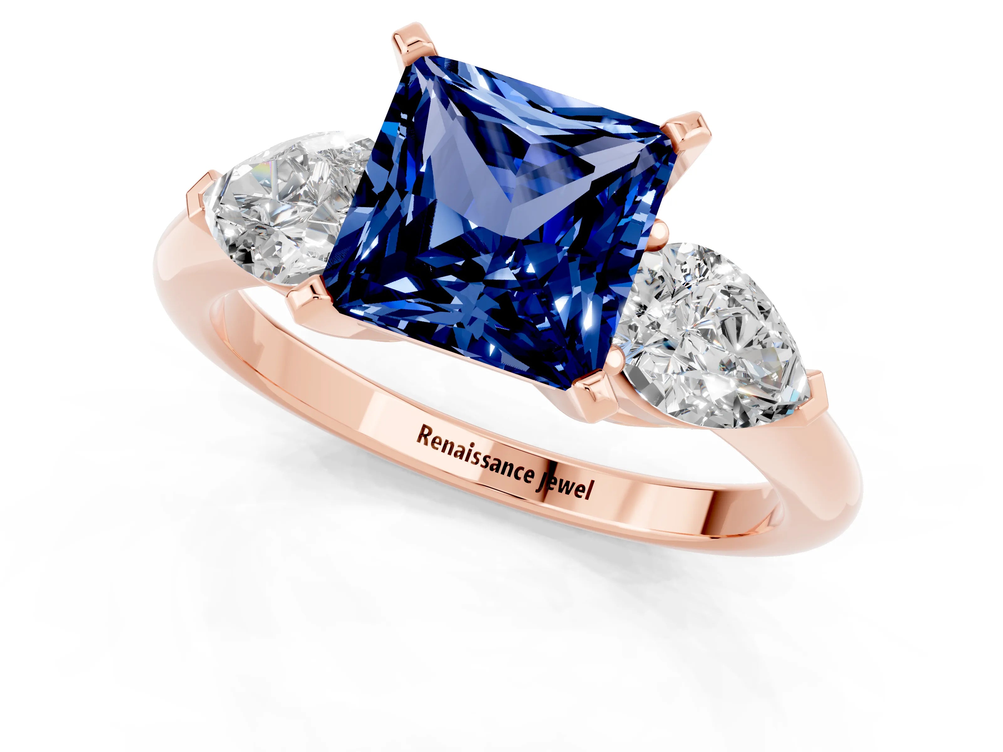 Rose gold Three-Stone Princess Cut Blue Sapphire Ring with Pear Side Stones and Four-Prong Setting_1