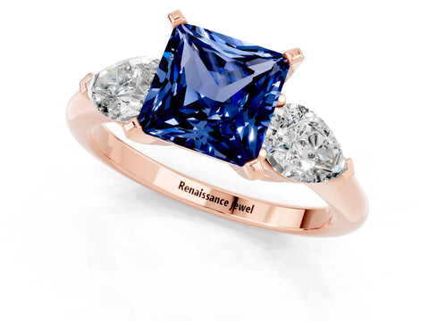 Rose gold Three-Stone Princess Cut Blue Sapphire Ring with Pear Side Stones and Four-Prong Setting_1