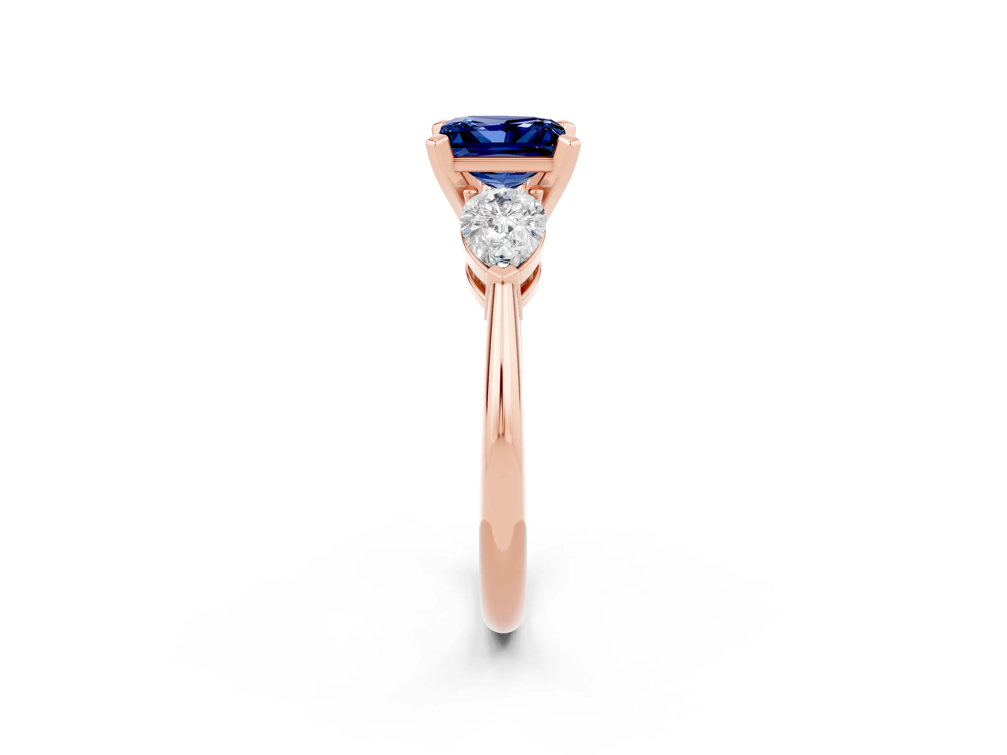 Rose gold Three-Stone Princess Cut Blue Sapphire Ring with Pear Side Stones and Four-Prong Setting_2