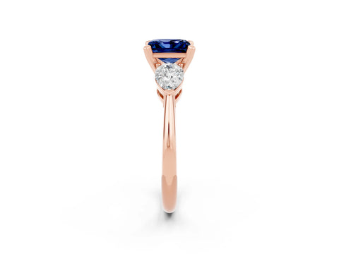 Rose gold Three-Stone Princess Cut Blue Sapphire Ring with Pear Side Stones and Four-Prong Setting_2