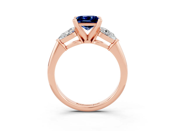Rose gold Three-Stone Princess Cut Blue Sapphire Ring with Pear Side Stones and Four-Prong Setting