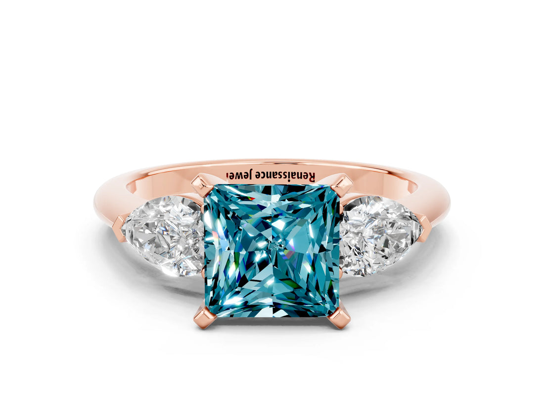 Rose gold Three-Stone Princess Cut Blue Topaz Ring with Pear Side Stones and Four-Prong Setting_12