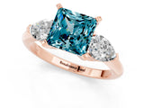 Rose gold Three-Stone Princess Cut Blue Topaz Ring with Pear Side Stones and Four-Prong Setting_13