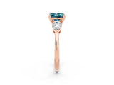 Rose gold Three-Stone Princess Cut Blue Topaz Ring with Pear Side Stones and Four-Prong Setting_14