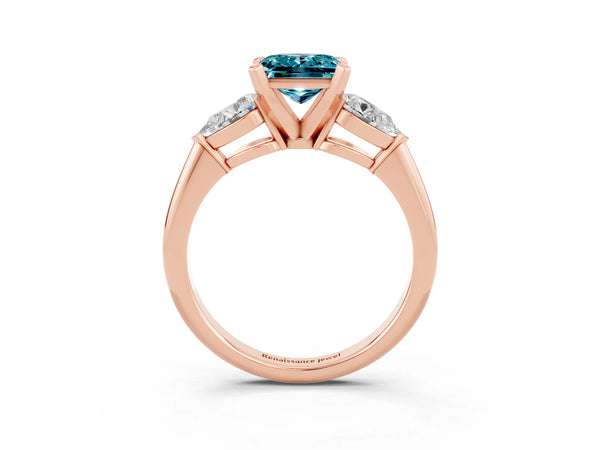 Rose gold Three-Stone Princess Cut Blue Topaz Ring with Pear Side Stones and Four-Prong Setting