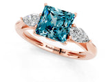 Rose gold Three-Stone Princess Cut Blue Topaz Ring with Pear  Side Stones in Four-Prong Setting_13