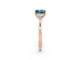 Rose gold Three-Stone Princess Cut Blue Topaz Ring with Pear  Side Stones in Four-Prong Setting_14