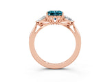 Rose gold Three-Stone Princess Cut Blue Topaz Ring with Pear  Side Stones in Four-Prong Setting_15