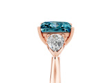 Rose gold Three-Stone Princess Cut Blue Topaz Ring with Pear  Side Stones in Four-Prong Setting_17