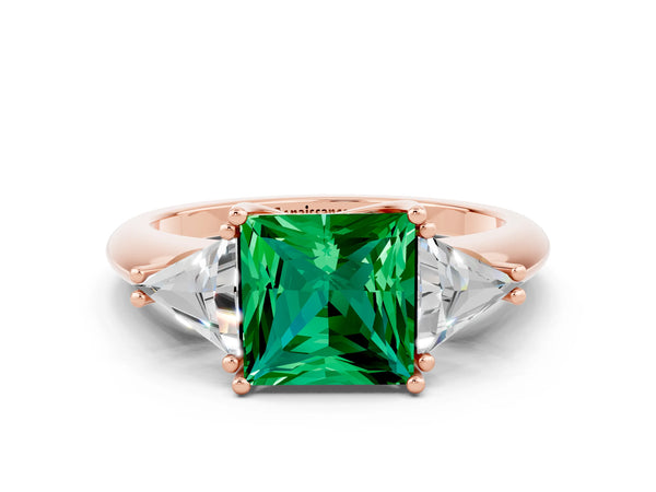 Rose gold Three-Stone Princess Cut Emerald Engagement Ring with Trillion Side Stones and Prong Setting