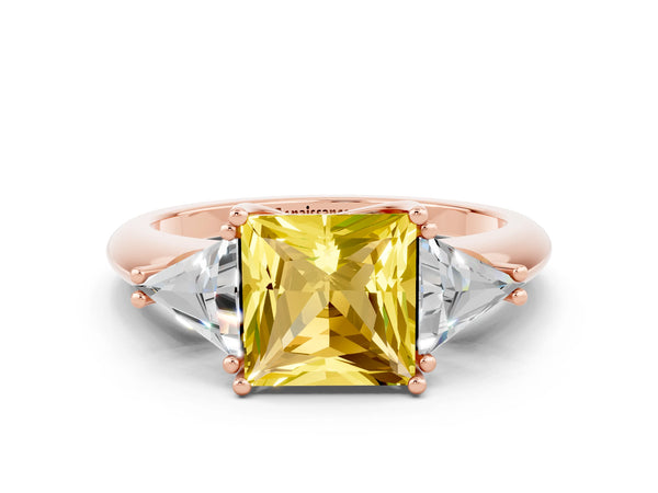 Rose gold Three-Stone Princess Cut Yellow Sapphire Engagement Ring with Trillion Side Stones and Prong Setting