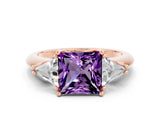 Rose gold Three-Stone Princess Cut Cut Diamond Ring with Trillion Side Stones and Four-Prong Setting