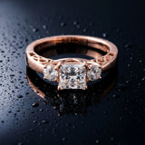 Rose gold Three-Stone Princess Cut Diamond Cathedral Engagement Ring with Prong Setting_9