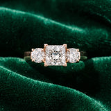 Rose gold Three-Stone Princess Cut Diamond Ring with Round Accent Stones, Prong Setting, and Classic Band_6