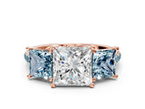 Rose gold Three-Stone Princess Cut Diamond Ring with Round with Aquamarine side stone Pavé Band and Prong Setting