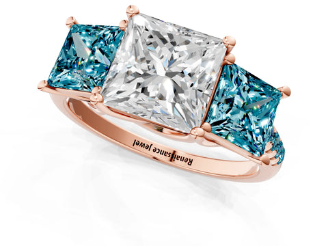 Rose gold Three-Stone Princess Cut Diamond Ring with Round with Blue Topaz side stone Pavé Band and Prong Setting_1