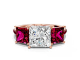 Rose gold Three-Stone Princess Cut Diamond Ring with Round with Garnet side stone Pavé Band and Prong Setting