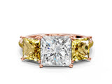 Rose gold Three-Stone Princess Cut Diamond Ring with Round with Yellow Sapphire side stone Pavé Band and Prong Setting