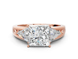 Rose gold Three-Stone Princess Cut Diamond Ring with Trillion Side Stones on a Split Shank Band_11