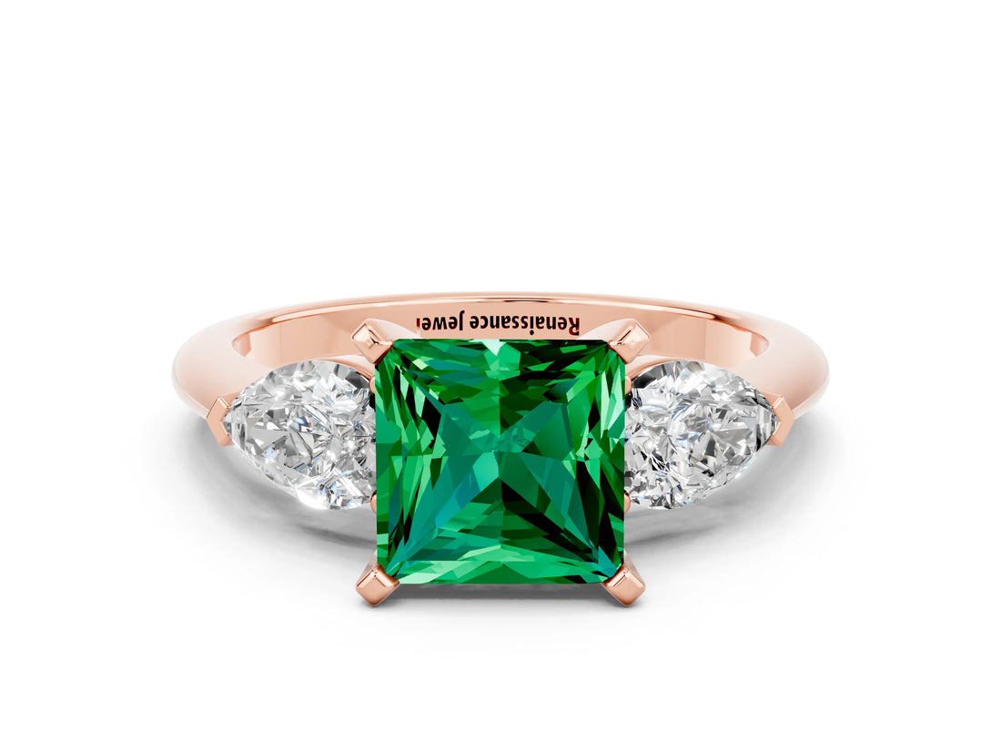 Rose gold Three-Stone Princess Cut Emerald Ring with Pear Side Stones and Four-Prong Setting