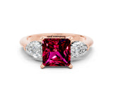 Rose gold Three-Stone Princess Cut Garnet Ring with Pear Side Stones and Four-Prong Setting