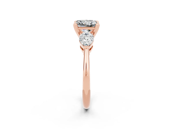 Rose gold Three-Stone Princess Cut Moissanite Ring with Pear Side Stones and Four-Prong Setting