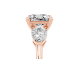 Rose gold Three-Stone Princess Cut Moissanite Ring with Pear Side Stones and Four-Prong Setting_5