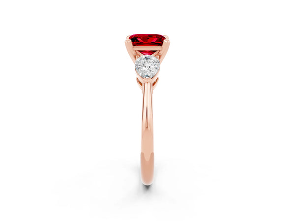 Rose gold Three-Stone Princess Cut Ruby Ring with Pear Side Stones and Four-Prong Setting