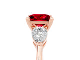 Rose gold Three-Stone Princess Cut Ruby Ring with Pear Side Stones and Four-Prong Setting_5