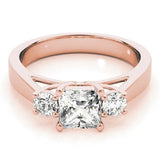 Rose gold Three-Stone Princess Cut Solitaire Ring with Round Side Stones and Four-Prong Setting 1