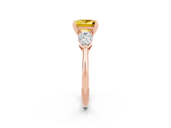Rose gold Three-Stone Princess Cut Yellow Sapphire Ring with Pear Side Stones and Four-Prong Setting