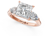 Rose gold Three-Stone Princess Diamond Ring with Pear Side Stones in Four-Prong Setting_85