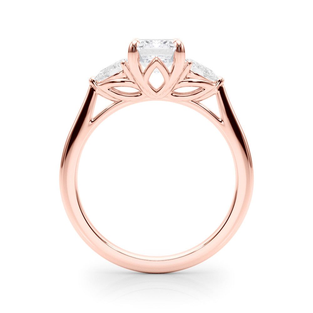 Rose gold Three-Stone Radiant Cut Diamond Ring with Pear Side Stones on a Platinum Band and Four-Prong Setting