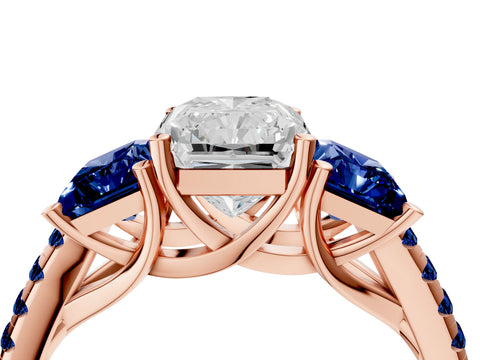 Rose gold Three-Stone Radiant Cut Diamond Ring with Round with Blue Sapphire side stone Pavé Band and Prong Setting_4