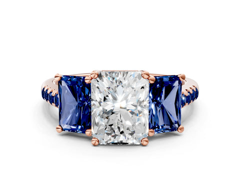 Rose gold Three-Stone Radiant Cut Diamond Ring with Round with Blue Sapphire side stone Pavé Band and Prong Setting